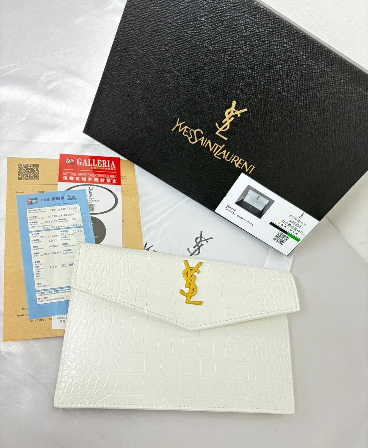 yves saint laurent pochette camosciata bianca