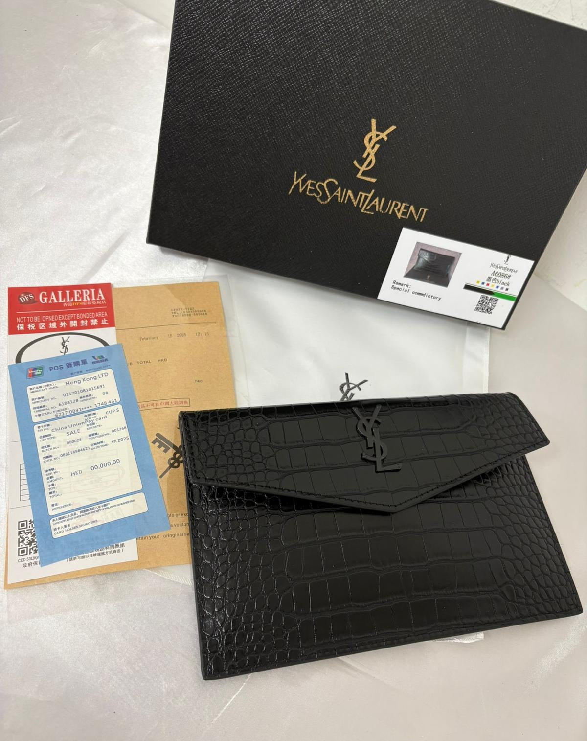 yves saint laurent pochette camosciata nera